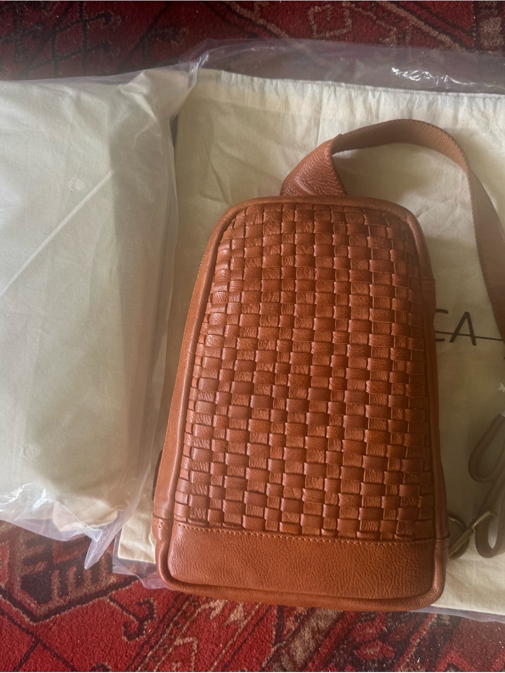Vilenca Holland Woven Leather Crossbody Bag in Cognac